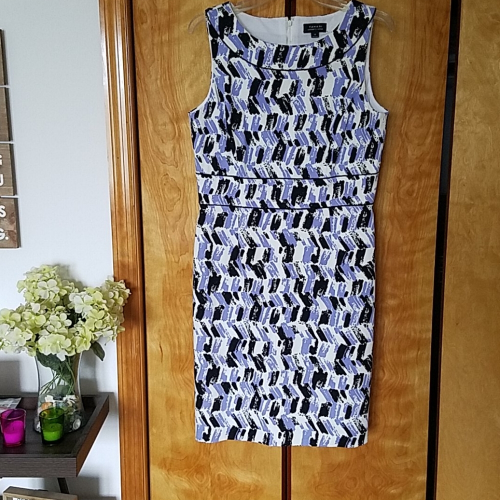 Tahari curve hugging dress.